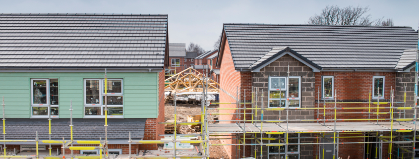 Scaffolding on building of construction site - Sorglos Bauen GmbH