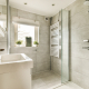 Toilet and shower in bathroom - Sorglos Bauen GmbH