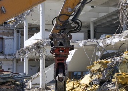 Excavator machine at a demolition construction site - Sorglos Bauen GmbH - Sorglos Bauen GmbH