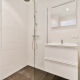 Attractive bathroom with shower cubicle - Sorglos Bauen GmbH